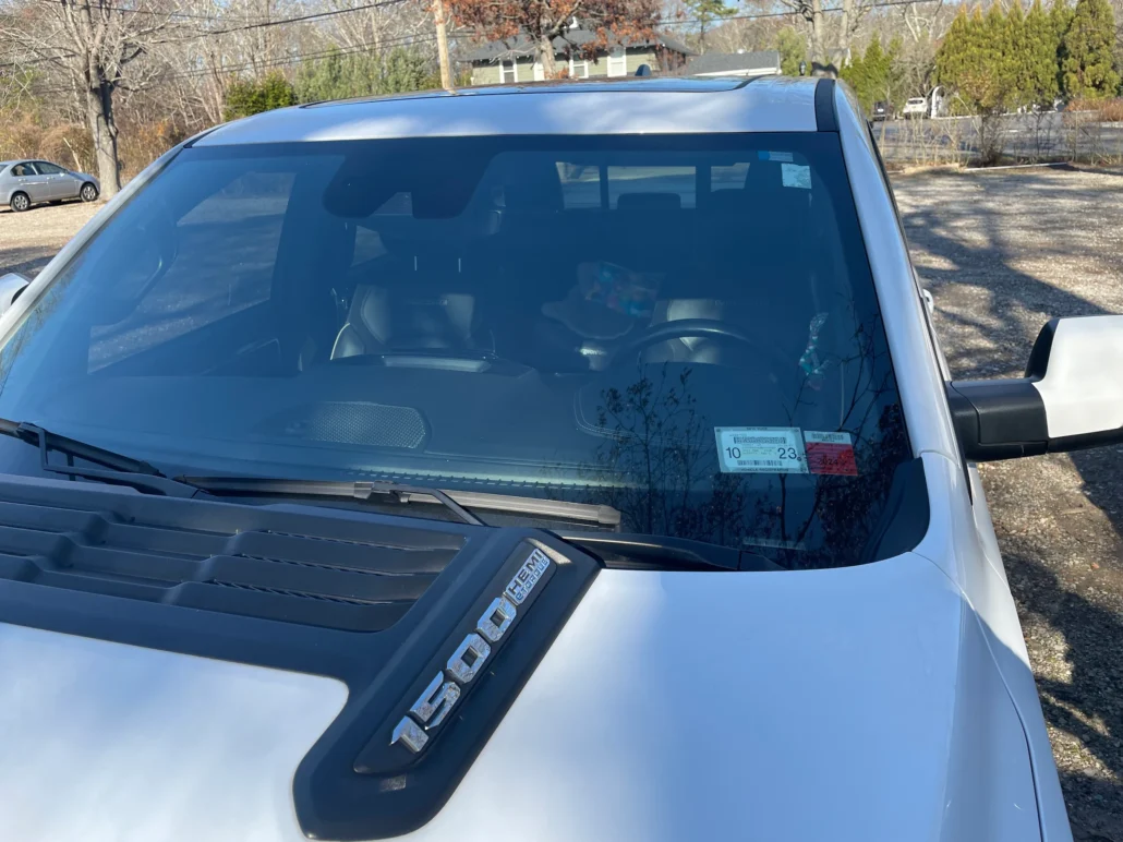 A car with a newly installed car windshield