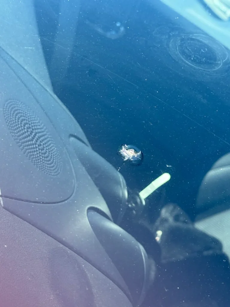 A windshield with a crack in it