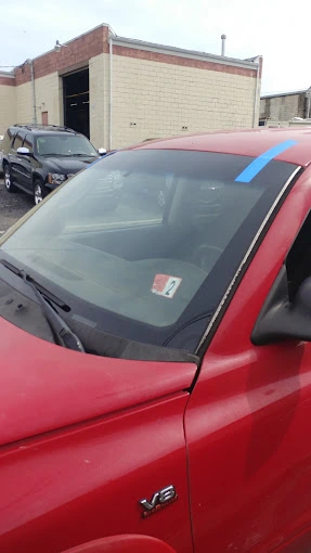 a truck with a new windshield installed